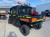 ehicle parked on a concrete surface with other vehicles in the background, ACOT500 Light Bar on it 